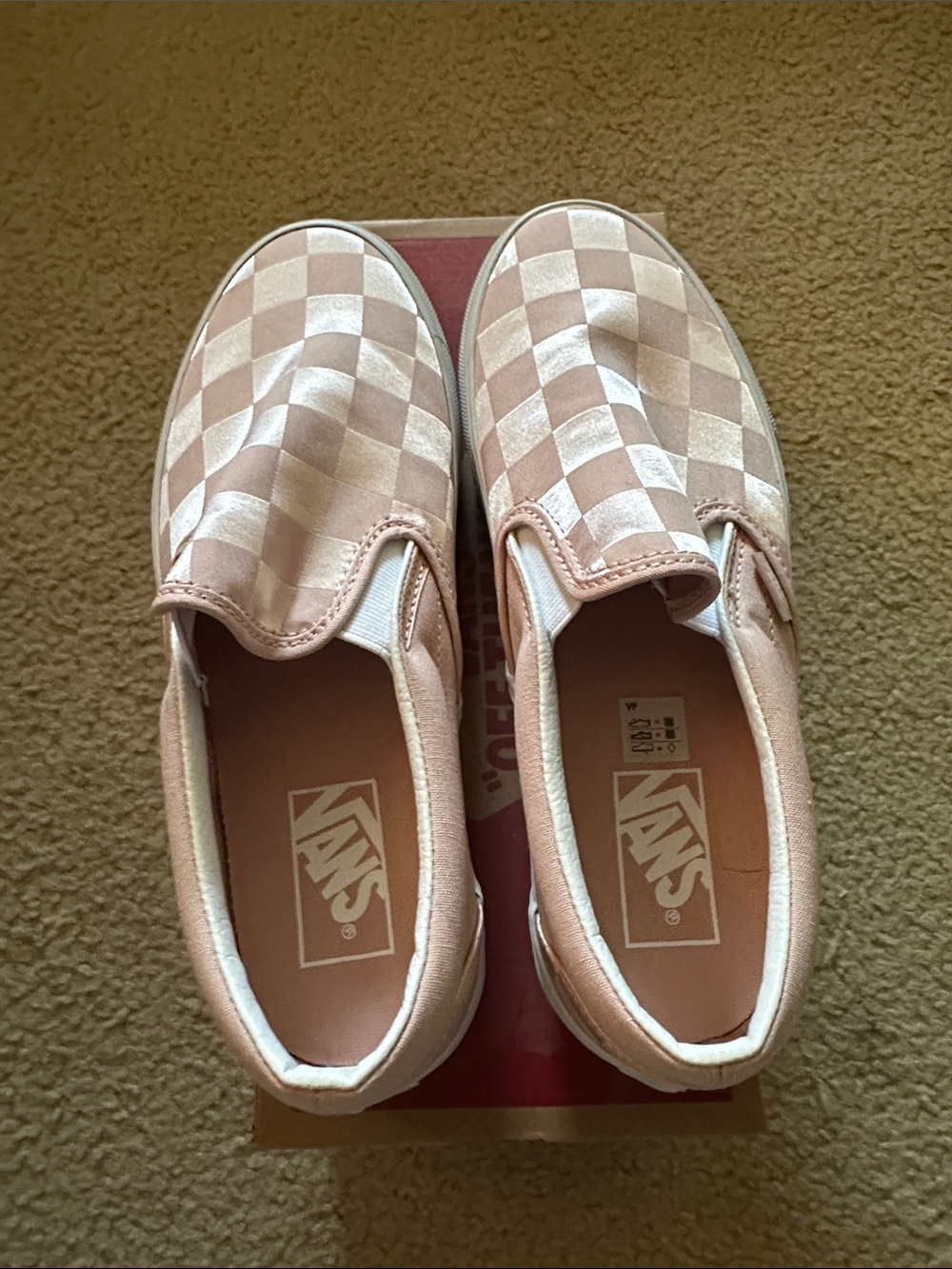 Vans Pink and White Checkerboard Slip-On Sneakers
